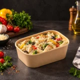 650ml rectangular kraft bowl holding a colourful salad